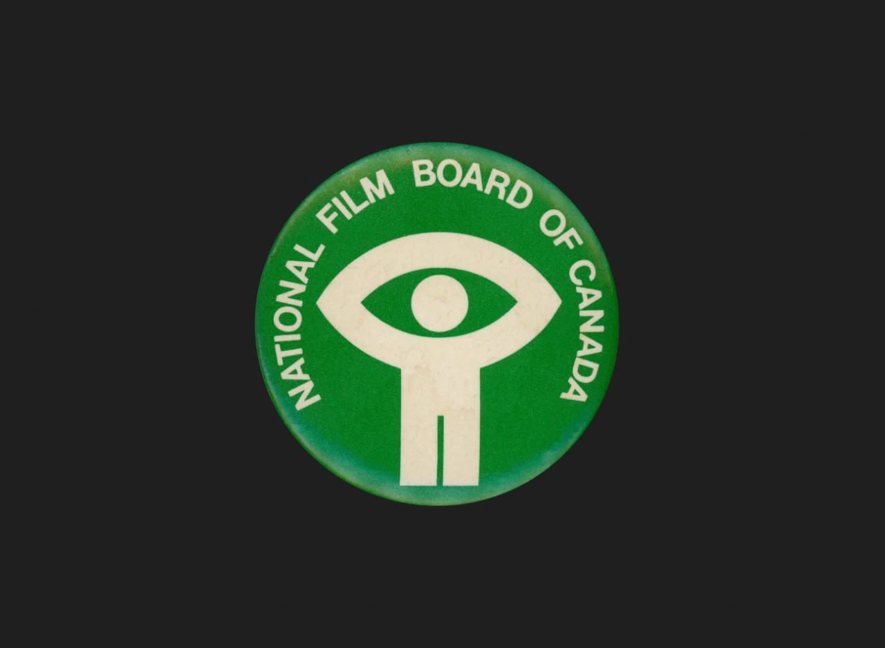 Green circular badge bearing the white National Film Board of Canada symbol and name