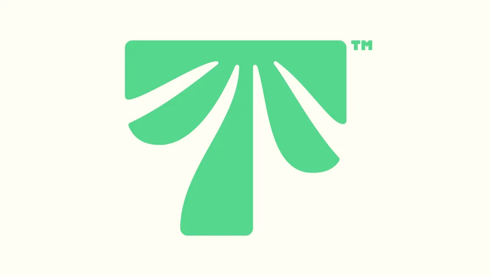 Green Tropical Smoothie Cafe logo combining a palm tree and the letter T