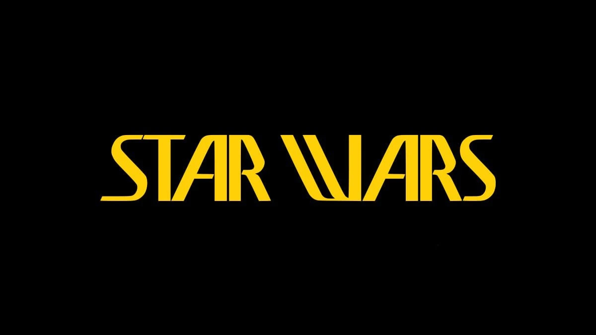 An early Star Wars wordmark with tall yellow letters on a single line against black.